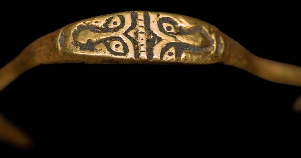 A unique gold ring with the image of a two-faced god was found in Poland.  PHOTO