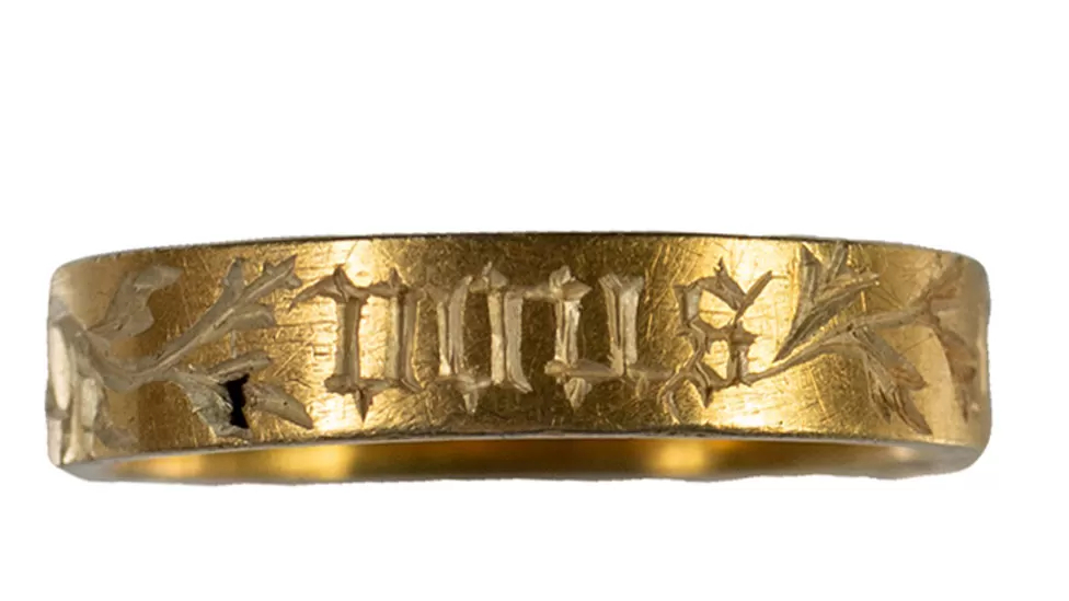 A medieval gold ring with a confession of love was found in England.  PHOTO
